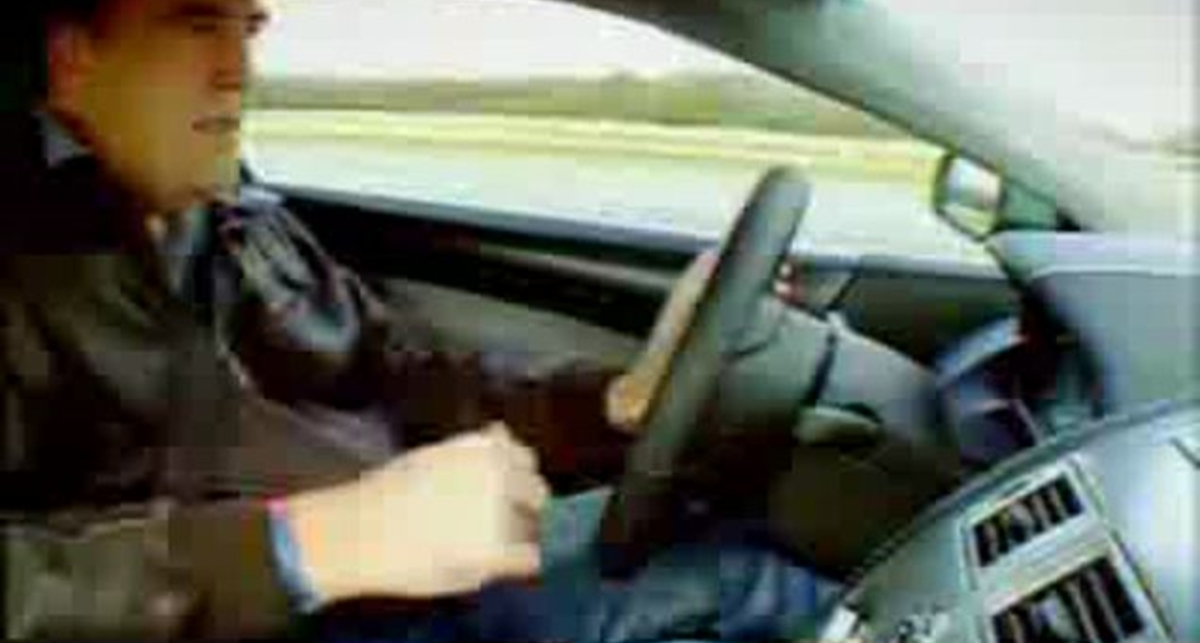 За рулем  Aston Martin DBS