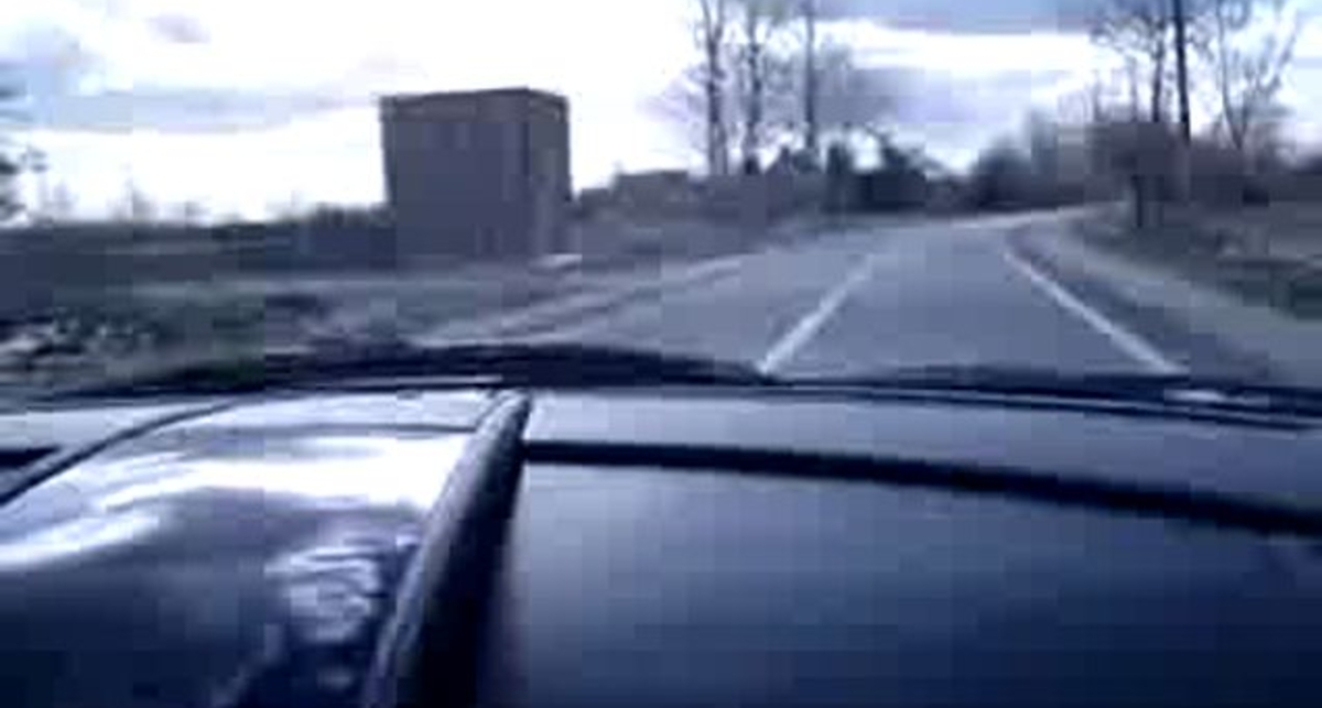 За рулем Aston Martin V8 vantage . . .