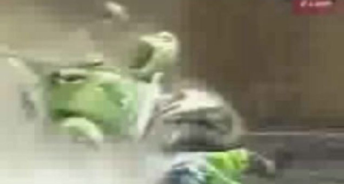 racers_bike_explodes_after_wipeout