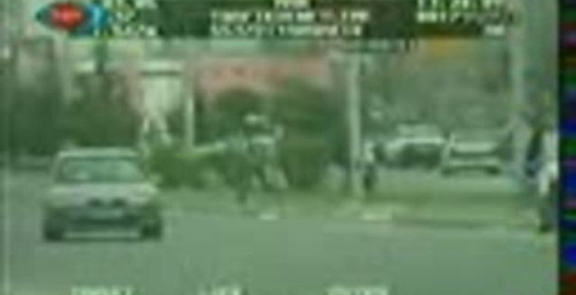 biker_gets_clipped_by_car