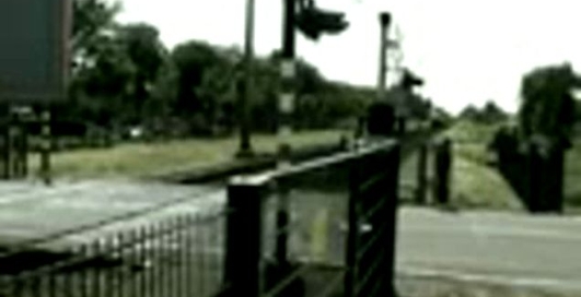 Сrazy driver nearly gets hit by train