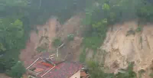 Оползень сносит дом сильным потоком грязи