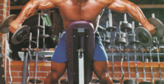 Махи гантелями в наклоне