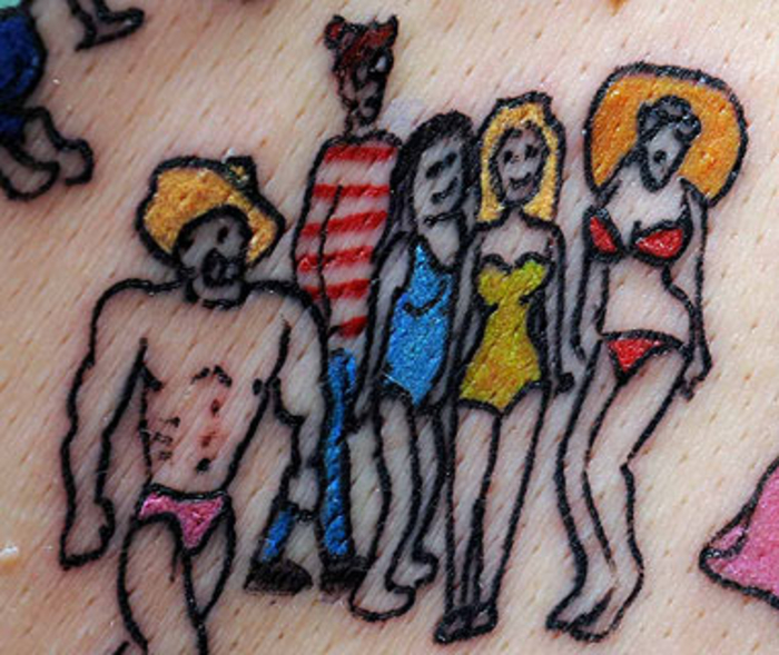 Тату за $3000: синие ребусы фаната