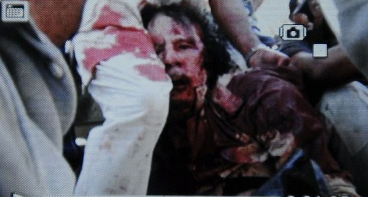 Муаммар Каддафи убит (ФОТО, ВИДЕО)