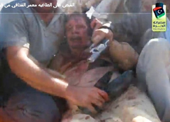 Муаммар Каддафи убит (ФОТО, ВИДЕО)