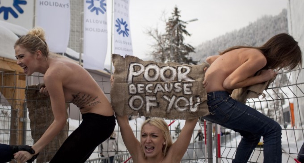 FEMEN в Давосе: эротические транспаранты