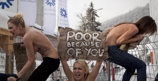 FEMEN в Давосе: эротические транспаранты